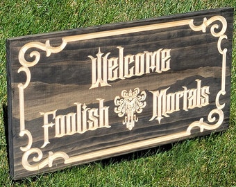 Disney The Haunted Mansion 'Welcome Foolish Mortals' carved wood sign