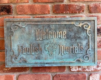 Disney The Haunted Mansion 'Welcome Foolish Mortals' carved sign Bronze paint with Patina aging