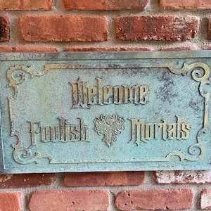 Disney The Haunted Mansion &#39;Welcome Foolish Mortals&#39; carved sign with Patina color