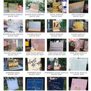 May include: A collection of acrylic signs with various colors and text. The signs are displayed on wooden stands and feature different designs, including "Reserved for family", "You should be here", "Almost Mr. & Mrs", and "Welcome to the Wedding".