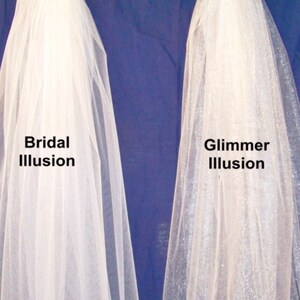 May include: Two white veils, one with a plain texture labeled "Bridal Illusion" and the other with a sparkly texture labeled "Glimmer Illusion".