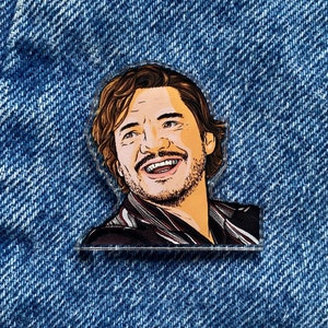 May include: A close-up of a cartoon illustration of a man with brown hair and a brown and white striped shirt. The man is smiling and looking to the right.