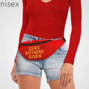 May include: Red fanny pack with a black strap and the text "ZERO BOTHERS GIVEN" in yellow letters. A red balloon with a black string is drawn above the text.