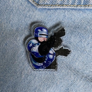 Insigne d'épingle en acrylique Murphy épinglette Detroit personnage visage badge broche film d'action en plastique coloré dessin 1987 des années 80 des années 80 I'd your