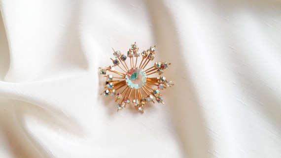Vintage Aurora Borealis rhinestone atomic brooch f