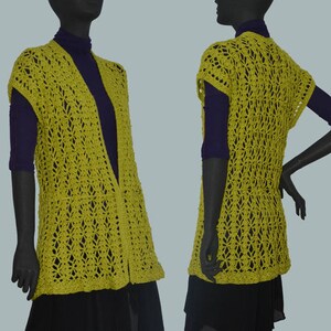 May include: A lime green crochet vest with a V-neck and short sleeves. The vest is open in the front and has a loose fit.