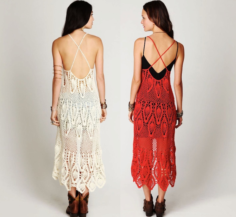 May include: Two women wearing long crochet dresses. The dress on the left is white and the dress on the right is red.