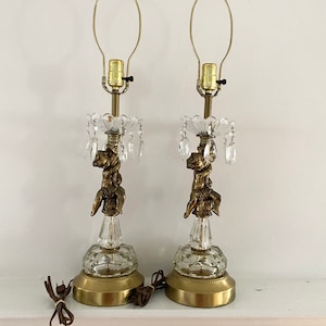 A Pair of Cherubs Crystal and Brass Table Lamps with Teardrop Prisms