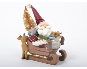 Santa's sleigh, multicolored resin. Height 9 inches and length 6'3 inches, for winter decoration