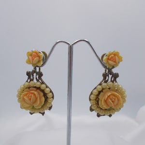 Vintage celluloid drop dangle earrings, gold tone screw  backs, peach floral design, tiny pearls