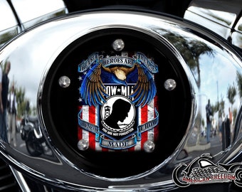 May include: A black motorcycle air cleaner cover with a patriotic design. The design features an American flag, an eagle with wings spread, and the words "The True Heroes Are The Ones Who Never Made It Home. You Are Not Forgotten."
