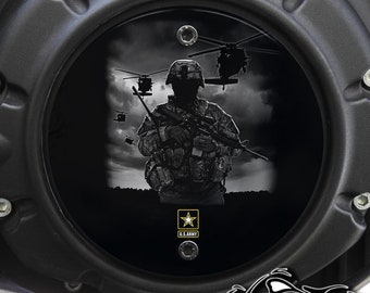 May include: Black and white image of a soldier in camouflage holding a rifle, with helicopters flying overhead. The soldier is standing in front of a cloudy sky. The image has a yellow U.S. Army star in the bottom center.