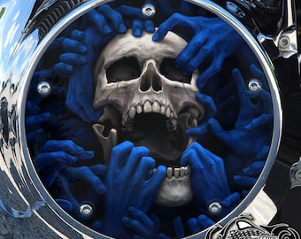 May include: A skull with a wide open mouth is surrounded by blue hands reaching towards it. The skull is white with black eye sockets and teeth. The hands are a dark blue color and appear to be trying to grab the skull.