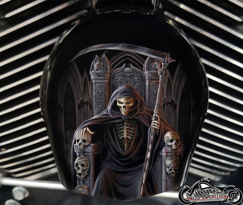 May include: A black and white illustration of the Grim Reaper sitting on a throne made of skulls. The Reaper is holding a scythe and a staff. The background is a dark, gothic scene.