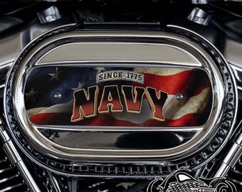 May include: Chrome motorcycle engine cover with a patriotic design. The cover features the word "NAVY" in red and gold lettering, set against a backdrop of the American flag. The text "SINCE 1775" is also visible. The image includes the "AMERICAN FREEDOM" logo.