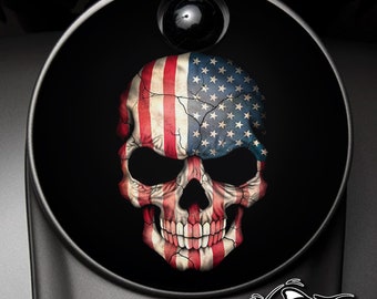 May include: A black and white skull with an American flag design. The skull is cracked and weathered, giving it a vintage look. The flag is red, white, and blue.