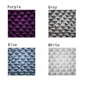 May include: Four close-up images of crocheted fabric in different colors: purple, gray, blue, and white. The fabric has a textured, waffle-like pattern.