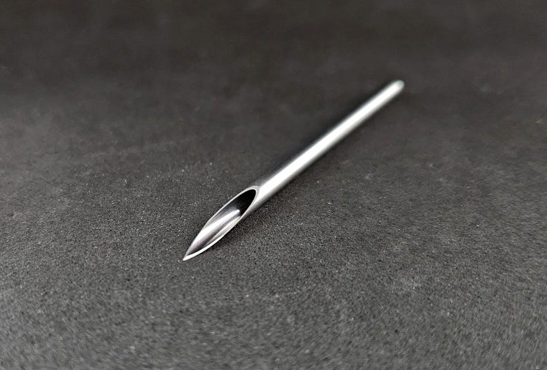 Hollow point piercing needle, approximately 50mm in length
