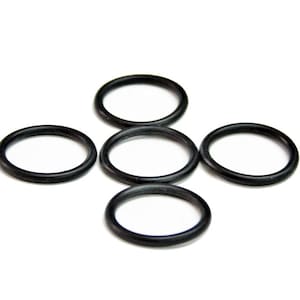 May include: Five black rubber O-rings of different sizes.