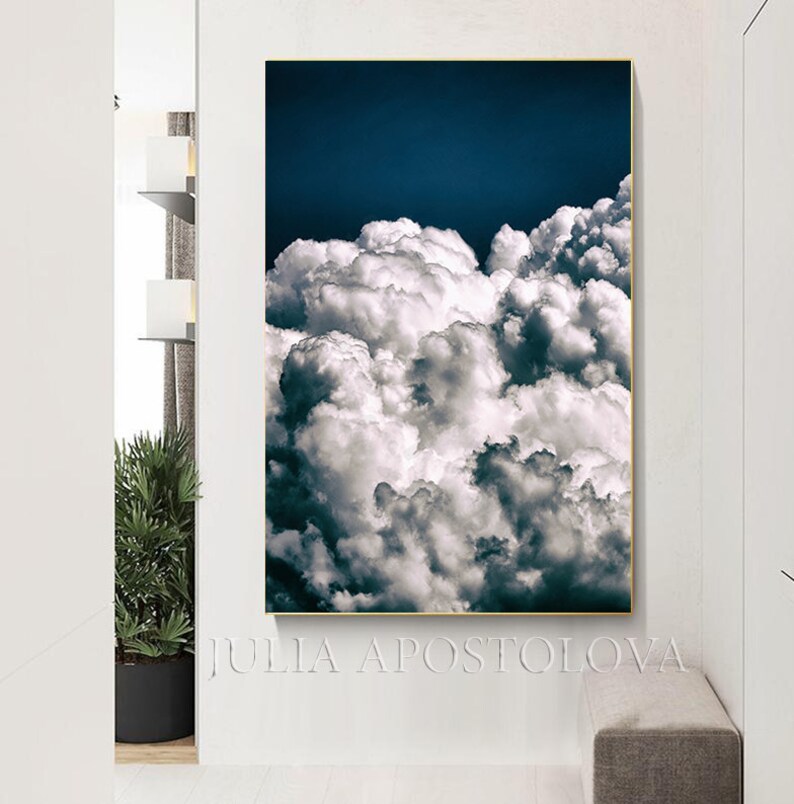 May include: A painting of a blue sky with white fluffy clouds. The clouds are arranged in a random pattern and fill the entire canvas.