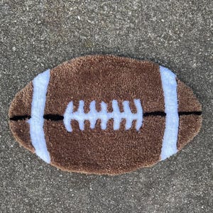 Football Rug: Brown, Black & White (17x11 inches)
