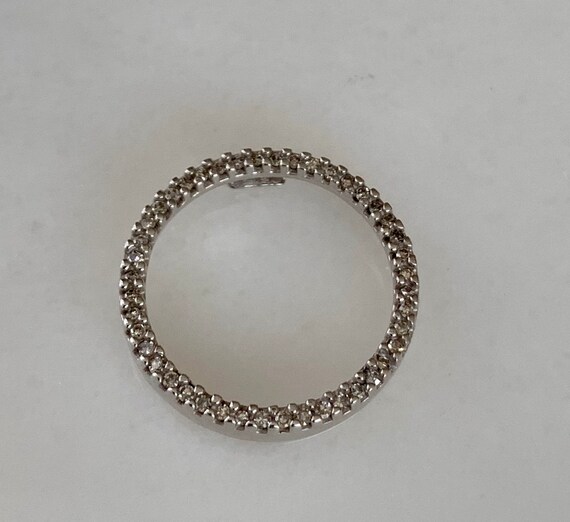 Lovely 10k White Gold Circle Diamond Pendant - image 1