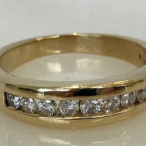 Men&#39;s 14k Yellow Gold Channel Set Diamond Band