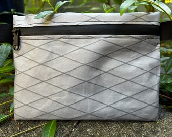 Cartera ultraligera Xpac V07 en color gris con cremallera impermeable HHH negra