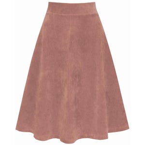 May include: A dusty rose corduroy skirt with a flared A-line silhouette. The skirt has a high waist and a vertical ribbed texture. The hemline falls below the knees. The skirt is a solid color and has a classic design.