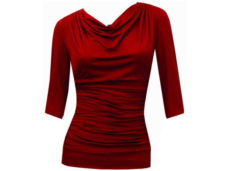 May include: A red, long-sleeved, cowl neck top with a fitted silhouette.