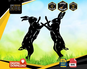 May include: Black silhouette of two rabbits standing on their hind legs, facing each other, with their front paws raised. The rabbits are set against a green grassy background with a blue sky.