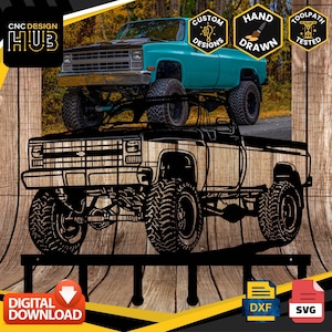 May include: Black and white silhouette of a vintage pickup truck with a wooden background. The truck has a large grill, a flatbed, and four large tires. The text "CNC DESIGN HUB" is in the upper left corner of the image. The text "CUSTOM DESIGNS, HAND DRAWN, TOOLPATH TESTED" is in the upper right corner of the image.
