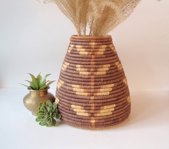 A Zulu Coiled Basket with Lid in Geometric Pattern A Zulu Coiled Basket with Lid in Geometric Pattern