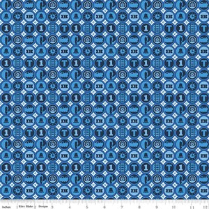 May include: A blue and white fabric with a repeating pattern of train-themed icons. The icons include a train engine, a wheel, a bell, and a number "1".