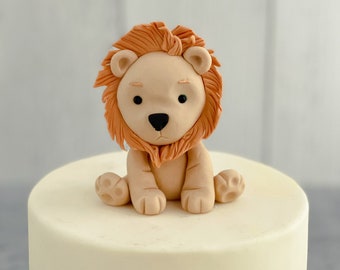 Topper na tort z motywem dżungli lub safari w kształcie lwa
