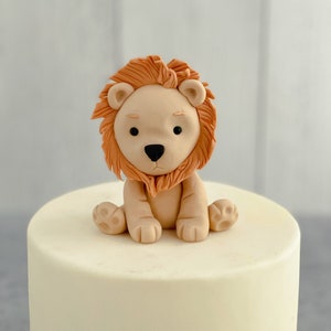 Adorno de pastel de león para una tarta de jungla o safari