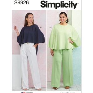 Könnte beinhalten: Simplicity Schnittmuster S9926, einfach zu nähen, zeigt zwei Frauen, die ein locker sitzendes, langärmeliges Oberteil mit weiten Hosen tragen. Das Oberteil ist in Marineblau und Hellgrün dargestellt. Die Hose ist in Weiß und Hellgrün dargestellt.