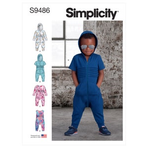 May include: Simplicity sewing pattern S9486 featuring a blue hooded jumpsuit with a zipper closure, short sleeves, and front pockets. The pattern also includes illustrations of other jumpsuit designs. The image shows a child wearing the blue jumpsuit.