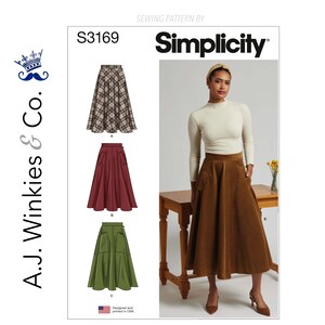 Könnte beinhalten: Simplicity Schnittmuster S3169 mit drei Rockdesigns: kariert, bordeaux und olivgrün. Eine Frau trägt einen braunen Cordrock mit Taschen. Das Logo von A.J. Winkies & Co. ist sichtbar.
