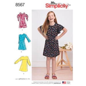 May include: A sewing pattern for a girl's dress. The pattern includes three different styles: a dress with ruffled sleeves, a long-sleeved dress, and a dress with a cape. The pattern is for sizes 8-16.