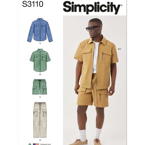 May include: Simplicity pattern S3110 shows a man in a tan shirt and shorts outfit. The pattern also includes illustrations of a denim shirt, green short-sleeve shirt, green shorts, and tan trousers. The text "Simplicity" is displayed.