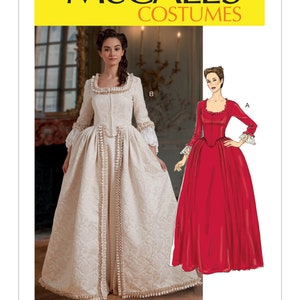 May include: McCall's Costumes pattern M7965. The image shows a woman in a cream-coloured historical gown with long sleeves and a full skirt. A red gown is also shown. The pattern includes the McCall's logo in yellow.