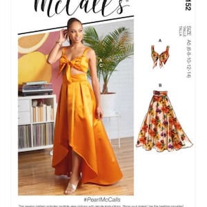May include: A sewing pattern for a high-low skirt and a crop top with a bow. The pattern is for sizes 6-8-10-12-14. The model is wearing a yellow version of the outfit. The pattern includes multiple view options with simple instructions. #PearlMcCalls