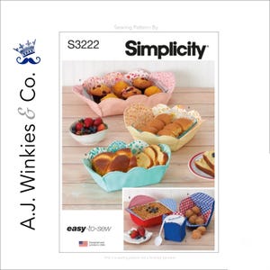 May include: Simplicity sewing pattern S3222 for easy-to-sew fabric baskets. The image shows several finished baskets in various colors and patterns, filled with baked goods and fruit. The pattern is designed and printed in the USA.