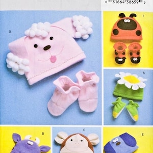 Puede incluir: Un patrón de costura para hacer gorros y botines para bebés. El patrón incluye diseños para un caniche, una mariquita, una flor, un mono, una vaca y un perro. El número del patrón es B4305.