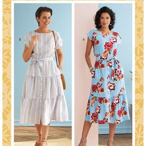 May include: A sewing pattern for a midi dress with two different styles. The dress on the left is a striped dress with a tie belt. The dress on the right is a floral print dress with a tie belt. The pattern is for sizes 6-8-10-12-14. The pattern number is B6722.