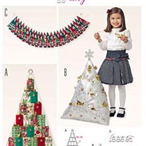 May include: A sewing pattern for a Christmas advent calendar in the shape of a tree. The pattern includes instructions for making a garland, a tree with pockets, and a tree with a flat front. The pattern is from Burda Style and is labeled "super easy".