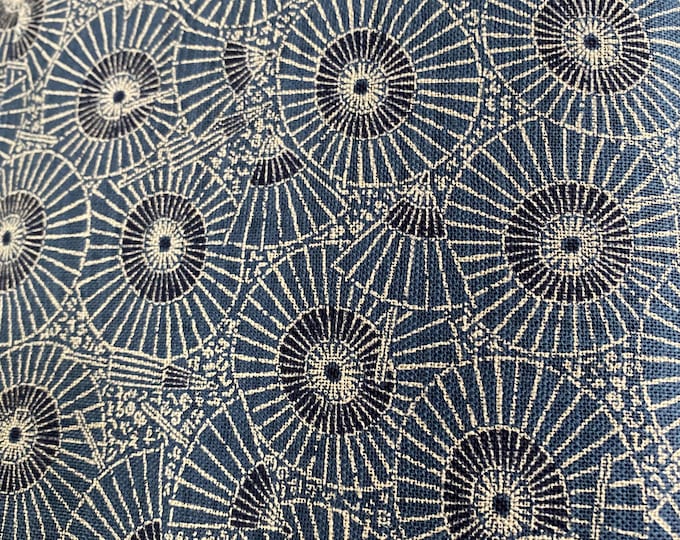 Indigo Parasols - mid blue  background Sevenberry Japanese Cotton . Fabric sold in 1/4mtr increments.