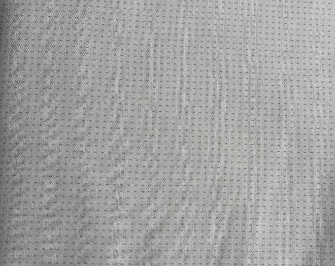 Cream cotton with printed tiny gridded grey dots
