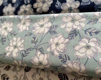 Magnolias , subtle navy colors on a pale duck egg blue background Japanese Linen/Cotton - fabric by the 1/4mtr